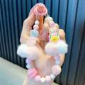 Charm de téléphone perlé rose et blanc mignon avec pompons en peluche doux - Pompon Rose