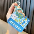 Creative blue mini piano keychain game machine with cute cartoon dog and lucky charm - Blue
