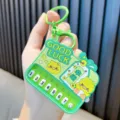 Cute green mini piano keyboard keychain toy with Good Luck print and music play buttons - Green
