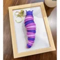 Flexible purple gradient fidget slug keychain stress relief toy for bags and car keys - Purple