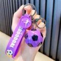 Purple 3D football keychain featuring Goal printed silicone wrist strap for backpack - Purple
