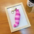 Colorful pink and purple segmented slug caterpillar keychain decompression toy for bags - Pink
