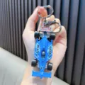 Kreativer blauer Legierung Formel 1 Rennwagen Schlüsselanhänger als schicker Rucksackanhänger - Blau