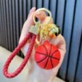 Portachiavi basket in gomma rossa con cinturino intrecciato e campanellino d'oro - Rosso
