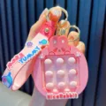 Adorable pink rabbit silicone pop-it fidget keychain featuring a More Yummy wrist strap - Pink