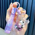 Cute purple panda liquid quicksand acrylic keychain charm for backpack with glitter strap - Milk Tea Cup