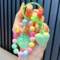 Colorful acrylic beaded keychain with green heart pendant and letter charms for women - Green