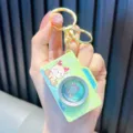 Llavero de cámara de dibujos animados verde con luz y sonido para bolsos - Verde