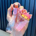 Cute pink cat-ear milk tea cup keychain with liquid floating glitter beads and PVC strap - Cat Ear Milk Tea Cup / Pink