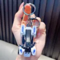 Detailed miniature white and black ATV beach motorcycle keychain toy for backpacks - White