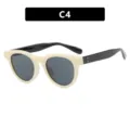 Gafas de sol retro cat-eye crema para mujer con elegantes patillas negras y lentes grises - Bisagra de Metal / Blanco Marfil Gris