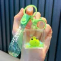 Green sports frog liquid glitter keychain with green strap and Just Keep Doing It text - Crawling / Green
