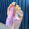 Portachiavi tazza di bubble tea viola con unicorno arcobaleno e glitter mobili - Viola