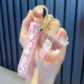 Portachiavi con unicorno rosa, ciondolo tazza di bubble tea e cinturino morbido in silicone - Rosa