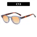 Gafas de sol redondas retro con lentes degradadas naranjas y patillas de carey C13 - Marco Azul Transparente Lente Doble Té Claro (C13)