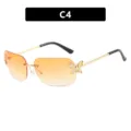 Stylish retro rimless sunglasses with butterfly accents and orange gradient lenses - Double Orange