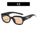 Trendy zwarte zonnebril met barnsteenkleurige glazen en zilveren accent, variant C2 - Glanzend Zwart Thee Lens