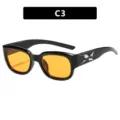 Trendy boemerang stijl zonnebril met zwart montuur en oranje glazen variant C3 - Glanzend Zwart Oranje Lens