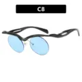 Gafas de sol vanguardistas con montura negra ondulada y lentes azules redondas C8 - Talla única / Negro Brillante Azul Claro