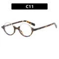 Vintage ronde schildpad bril met gouden metalen montuur en uniek stijlvol nerd design. - Gele Bloemen Witte Lens