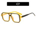 Lunettes de soleil carrées jaune et noir tendance avec double pont et rivets clous - Monture Jaune Verres Transparents