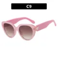 Roze cat-eye zonnebril voor dames met een groot montuur en edelsteenaccenten op de pootjes - Jelly Roze Thee Lens