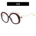 Montura de gafas redonda color burdeos con patillas doradas onduladas y detalle perla - Gafas de Plano Redondas de Gran Tamaño (3238-C3) / Marco Té Oscuro Lente Clara