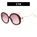 Oversize Retro-Burgunder-Rundbrille mit goldenen Wellenbügeln und elegantem Perlenakzent - Dunkelbrauner Rahmen Rosa-Gelbe Gläser