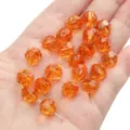 10mm orange faceted crystal beads for DIY jewelry making, SKU variant shown on hand - Round Beads / 10mm Approx 42 Pcs / Orange Red