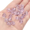 10mm faceted light purple bicone crystal beads shown in hand for DIY jewelry making - Diamond Pattern / 10mm Approx 46 Pcs / Light Purple