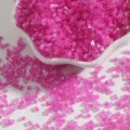 Close-up of 2mm hot pink H-tube silver-lined glass seed beads for DIY jewelry making - 15g/Pack (Approx. 700 Pcs) / Rose Red