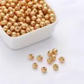 14k gold-plated copper round spacer beads for DIY jewelry making in glossy finish - 2mm (100 Pieces/Pack) / 18K Gold Filled