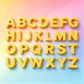 Macro view of 26 yellow 3D acrylic alphabet beads for DIY jewelry and keychain making - 2 Pieces/Pack (15x21mm) / Golden