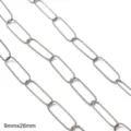 Detailed macro view of textured stainless steel oval link chain for DIY jewelry craft projects - Embossed Paperclip Chain / 9x26mm (One Meter/Pack) / Steel