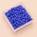 Solid blue peanut-shaped acrylic two-hole beads for DIY jewelry making in a clear container - Approx. 100 Pieces (4x6mm) / Sapphire Blue