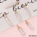 Natural irregular baroque pearl pendants with gold caps, 25-35mm size range. - 1 Piece/Pack (Length 25-35mm)