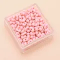 Hellrosa erdnussförmige Acryl-Doppellochperlen für handgefertigte Schmuck-DIY-Projekte - Ca. 100 Stück (4x6mm) / Unifarben Rosa