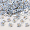 Mini pendentifs fleurs en résine bleu clair avec boucles dorées pour bijoux DIY - Fleur De Gainier / 7mm (5 pièces/paquet) / Bleu