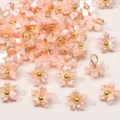 Breloques fleurs en résine rose nacrée avec centre en perle dorée pour bijoux DIY - Fleur De Gainier / 7mm (5 pièces/paquet) / Vert Pâle