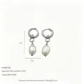 Detailed macro view of 304 stainless steel hoop earrings with pearls and 3cm drop length - Silver Style (MSE0762-S) / 18K Purity / Silver