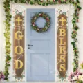 Decorative floral wood grain God Bless banners hanging on a blue front door for home decor - 30x180cm