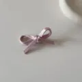 Close-up detail of a dusty pink satin ribbon bow hair accessory in balletcore style - Small Bow Hair Clip (1#) / Pink