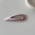 Detailed macro view of a soft pink satin covered snap hair clip with elegant shimmer - BB Clip (4#) / Pink