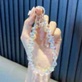 Correa de muñeca de cristal iridiscente con dije de perro globo plateado - Parche para teléfono incluido / Blanco