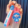 Cute Cartoon Rabbit Girl keychain with pink strap and blue flower charm for school bags - Rabbit Girl / Pink