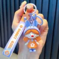 Cute cartoon rabbit girl character keychain in purple and orange colors with wrist strap - Rabbit Girl / Purple