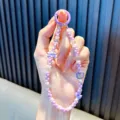 Purple beaded phone strap with cute bear charm and purple ring clasp - Purple