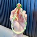 Handmade mint green beaded phone strap with cute bear and bow charms for bags - Green