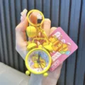 Handbediende levendige gele Genki Duck mini alarm klok metalen sleutelhanger met bel - Geel