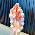 Handmade pink beaded phone strap keychain with sweet bow charm and houndstooth bead - Pink